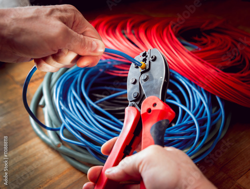 Electrical equipment. Electricity cable and crimper.