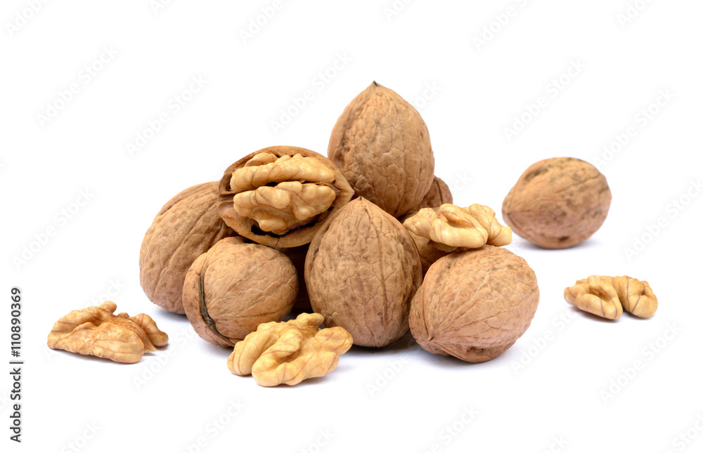 Fresh walnut with a shell isolated on white background