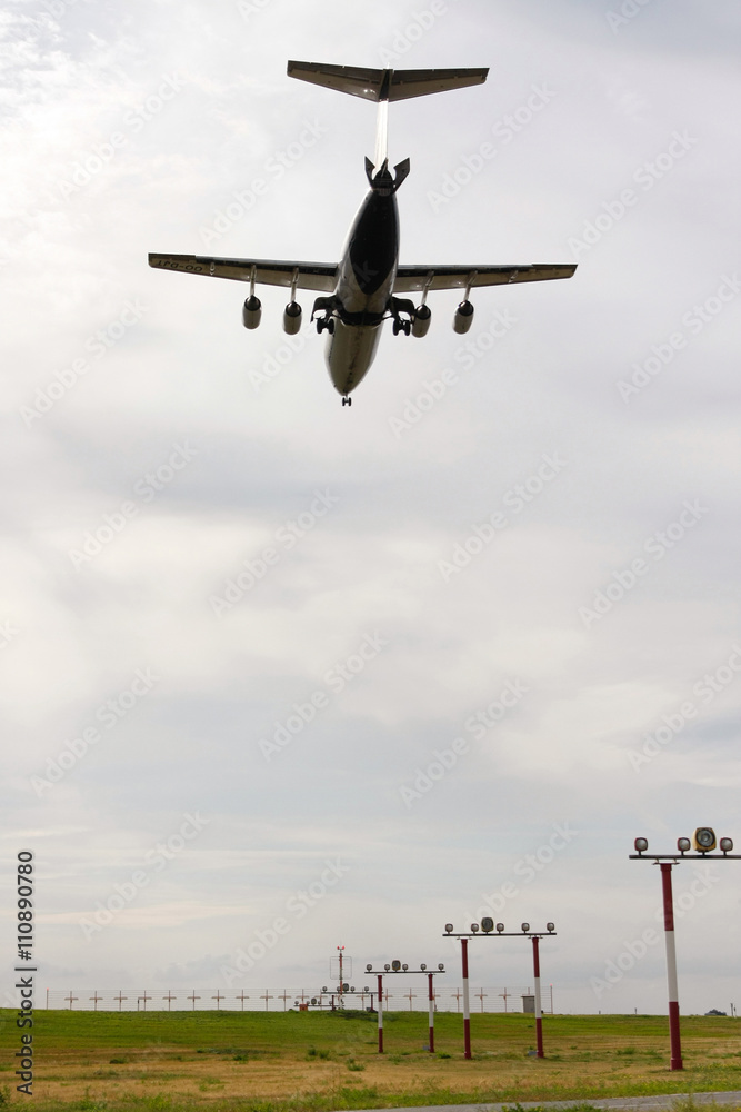 airplane short time before arrival on the landing runway airplane short time before arrival on the landing runway