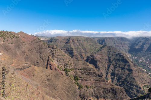 La Gomera. Trail over the Barranco de Arure. The Barranco de Arure is a side valley from the Valle Gran Rey. The long distance trail to the village Arure leads over the left altitude of the ravine