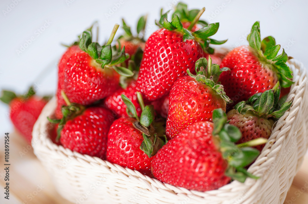 Stack strawberries in basket