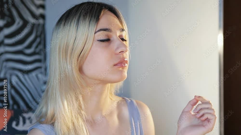 Close up shot of girl eating potato chips Close up shot of girl eating potato chips