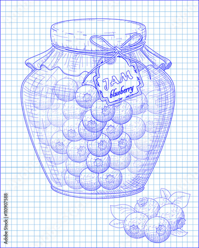 beautiful jar of homemade jam with blueberry on a notebook backg