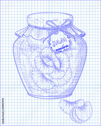 beautiful jar of homemade jam with mandarin on a notebook backgr