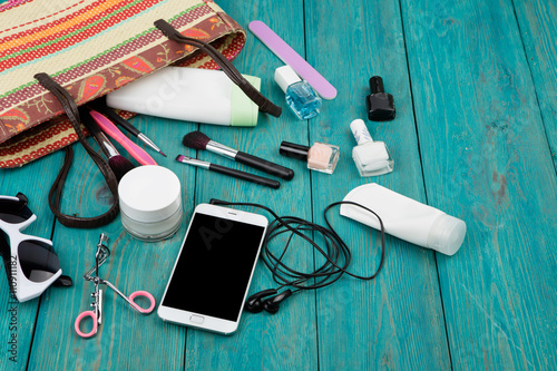 summer women set with straw bag, smartphone with headphones