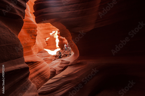 Tourists in the entrace of Antelope Canyon photo