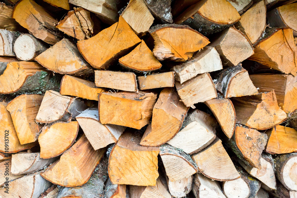 Pile of firewood, Chopped firewood, stacked and ready for winter. Pile of firewood, Chopped firewood, stacked and ready for winter.