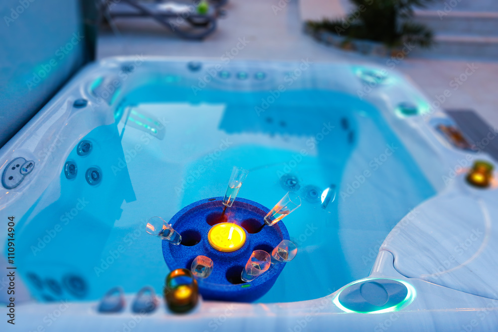 Private romantic jacuzzi with champagne and candles
