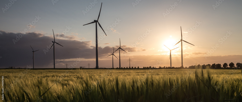wind turbine farm sundown - obrazy, fototapety, plakaty 