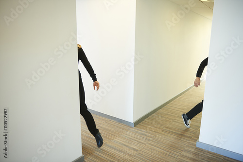People walking across corridor photo