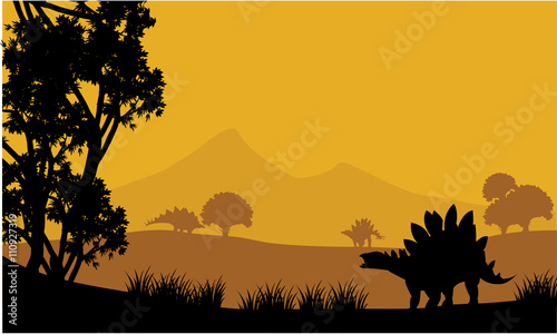 Landscape of stegosaurus silhouette