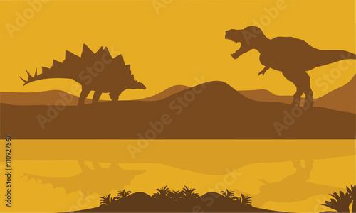 Silhouette of stegosaurus and parasaurolophus 