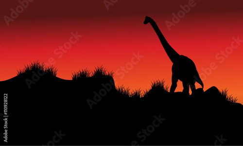 one brachiosaurus in fields at morning © wongsalam77