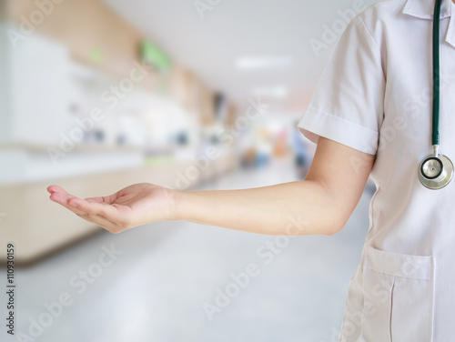 doctor with blur hospital background