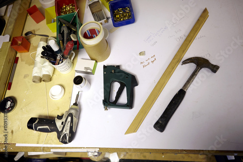 Still life of workbench in picture framers workshop photo