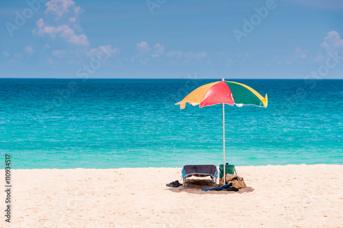 Umbrella on the beach. © nuwatphoto