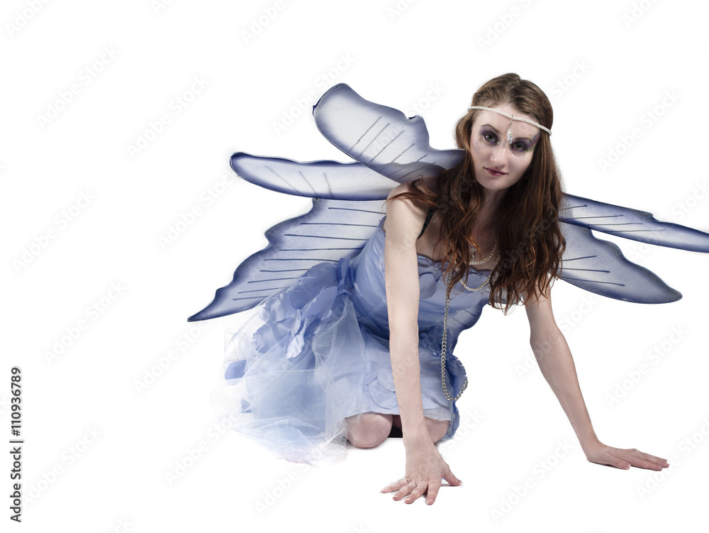 portrait of a fairy kneeling on floor. portrait of a fairy kneeling on floor.
