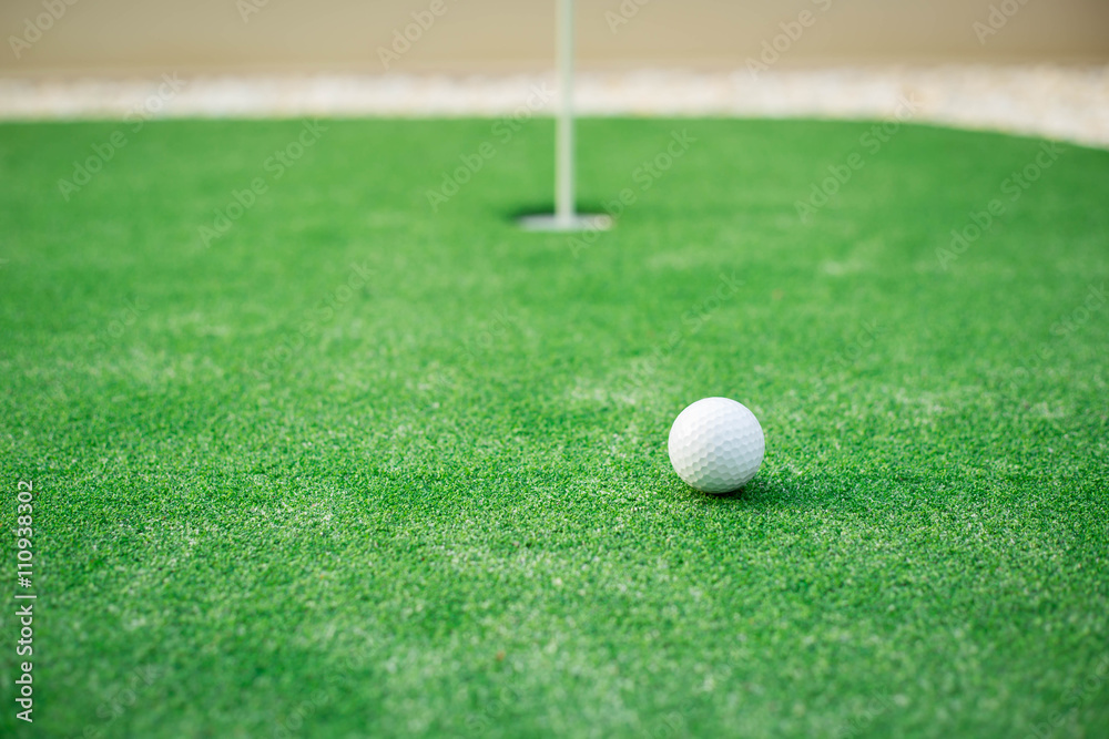 golf ball close to the hole golf ball close to the hole