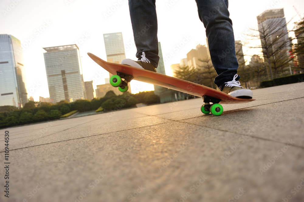 skateboarder legs skateboarding at sunrise city skateboarder legs skateboarding at sunrise city