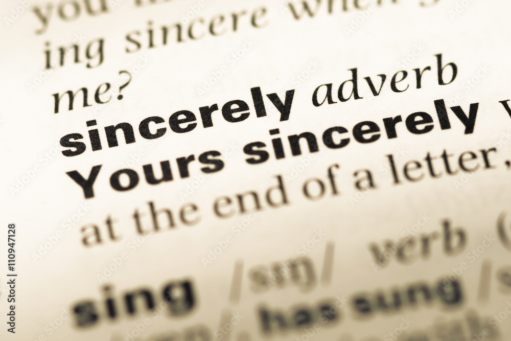 Close up of old English dictionary page with word sincerely Close up of old English dictionary page with word sincerely