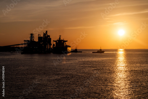 Silhouettes of ship and cranes in a port of Santarem city, Brazil