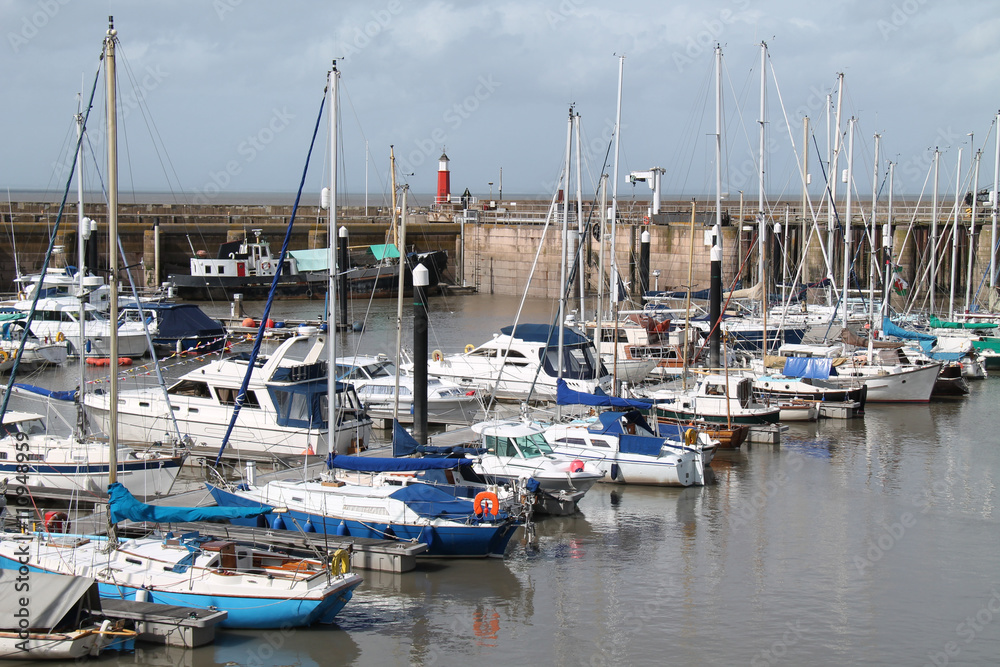 A Collection of Boats Moored in a Coastal Harbour.
