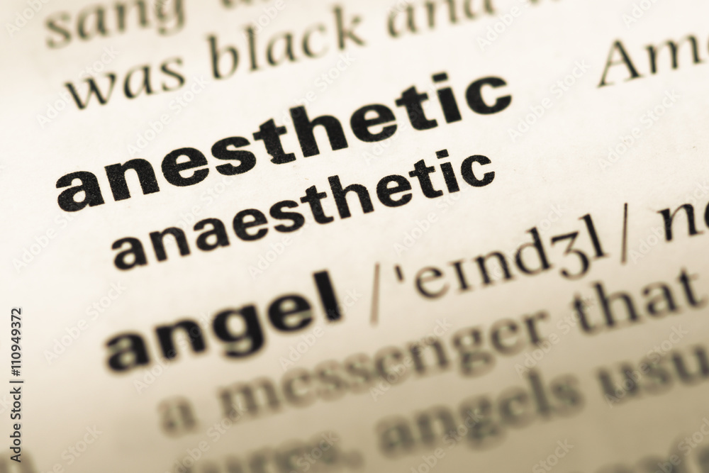 Close up of old English dictionary page with word anesthetic Close up of old English dictionary page with word anesthetic