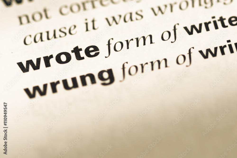 Close up of old English dictionary page with word wrote Close up of old English dictionary page with word wrote