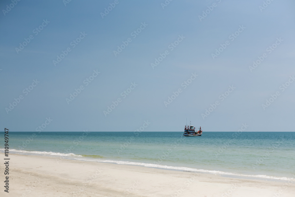 Beautiful beach with Fishing boat for background
