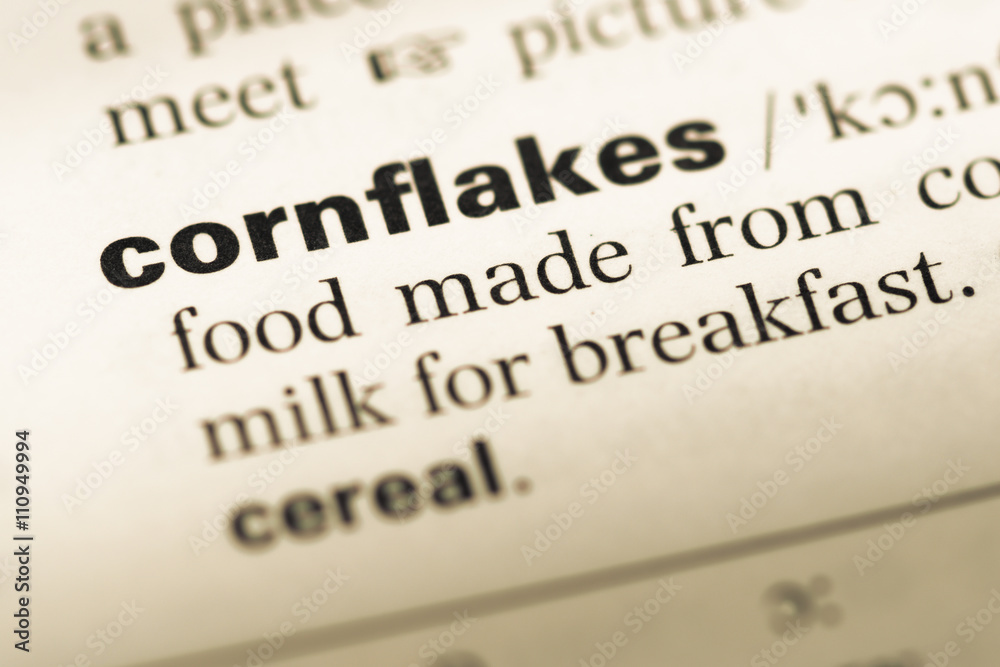 Close up of old English dictionary page with word cornflakes