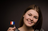 Beautiful woman with a French flag