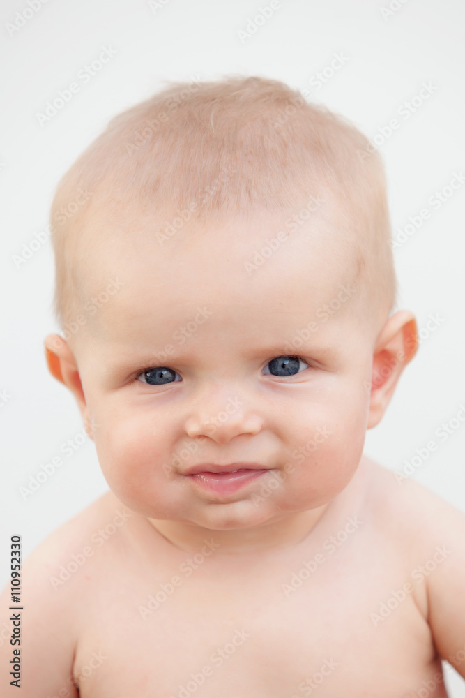 Little baby six month with blue eyes and blond hair Little baby six month with blue eyes and blond hair