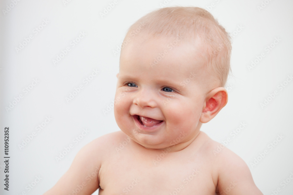 Little baby six month with blue eyes and blond hair Little baby six month with blue eyes and blond hair