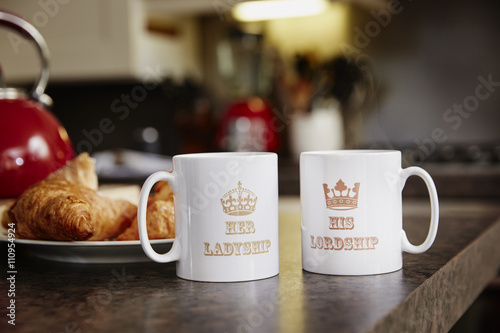 Two mugs on table, close up