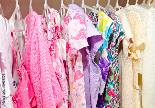 Colorful wardrobe of children clothes © svetamart