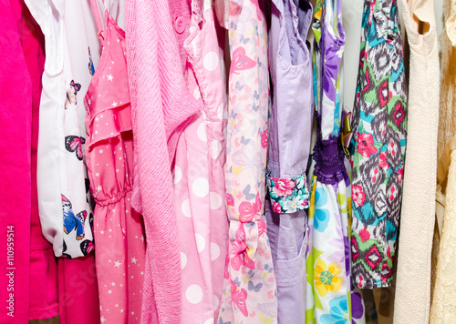 Colorful wardrobe of children clothes © svetamart