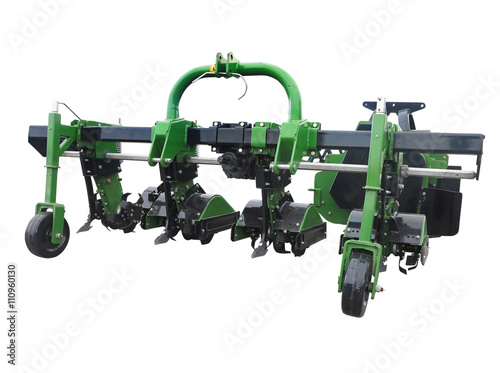 Green new farm cultivator plow for tractors isolated over white