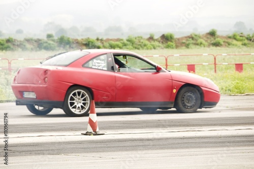 Red sport car on race © ibriholko