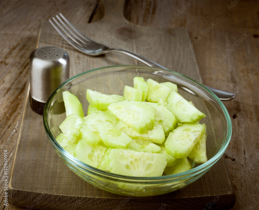 cucumber salad bowl on wooden cucumber salad bowl on wooden