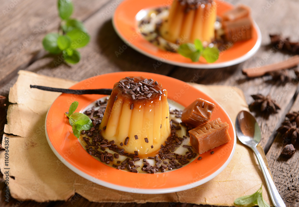 Panna cotta with caramel suce and chocolate flakes