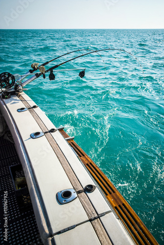 Two Fishing Poles Mounted on a Boat © Pvstockmedia