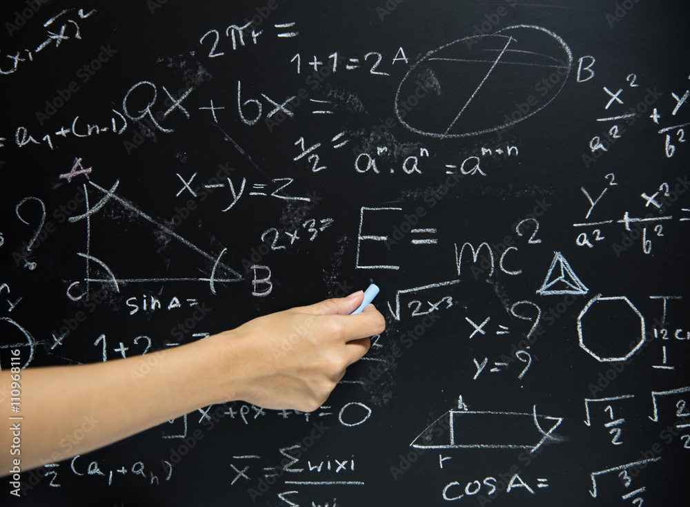 Teacher Hand drawn mathematics on chalkboard. Teacher Hand drawn mathematics on chalkboard.