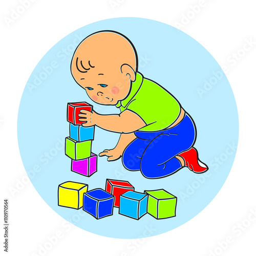 Little lovely baby boy playing with toys. Kid plays with pyramid