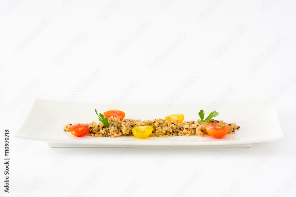 Quinoa, tomatoes and spinach isolated on white
background Quinoa, tomatoes and spinach isolated on white
background