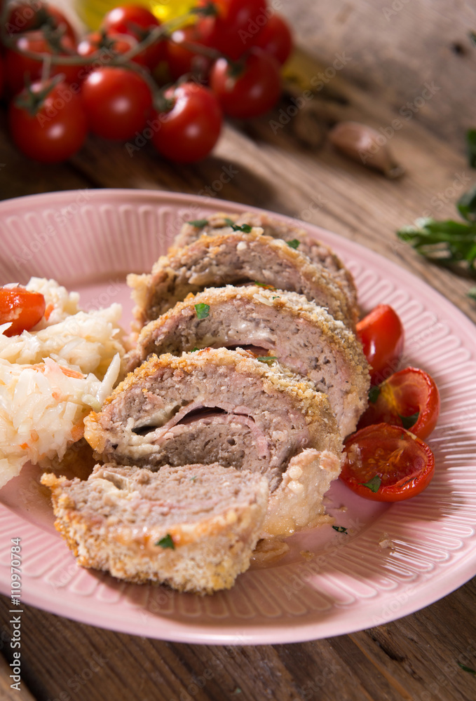 Meat roll stuffed with cheese and ham Meat roll stuffed with cheese and ham