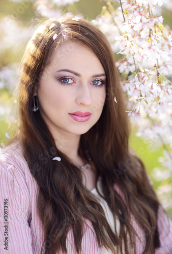 Spring portrait of beautiful young brunette