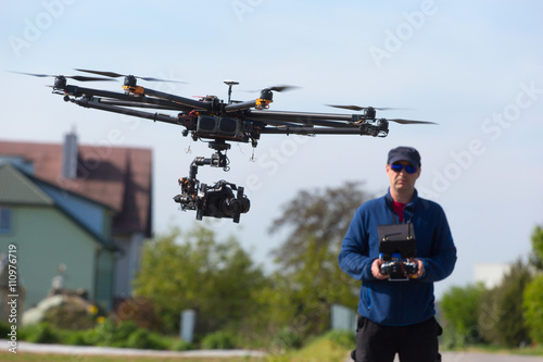 Drone, Unmanned copter flight, pilot flying drone 