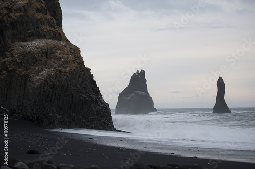Ocean waves with black sand beach at South Iceland coast
