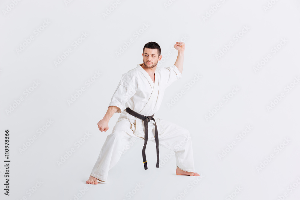 Male fighter standing in defensive stance Male fighter standing in defensive stance