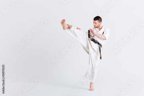 Man in kimono fighting